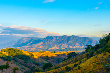 Beautiful  landscape view of hill and  mountain with cloud sky.