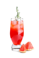 Glass of refreshing grapefruit lemonade on white background