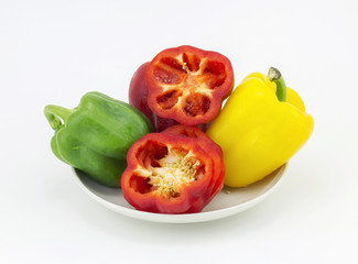 Colorful of sweet pepper and sliced pepper isolated on white background