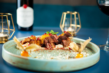 Tasty restaurant gastronomy with red wine on the table. Fine dining