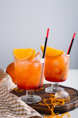Fresh summer cocktail in glasses on wooden board