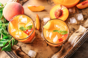Fresh summer cocktail in glasses on metal tray