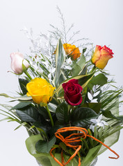 Bouquet of assorted multicolored roses isolated on white background