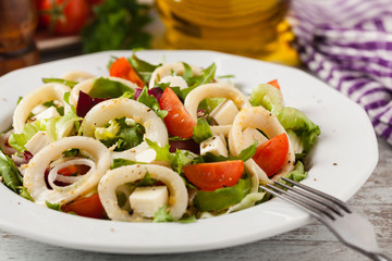 Salad with squid rings.