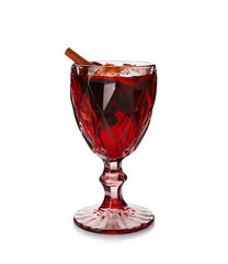 Glass of delicious mulled wine on white background