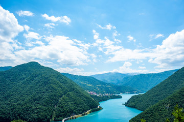 Aerial view of beautiful Piva Lake (Pivsko Jezero) and mountains in Montenegro