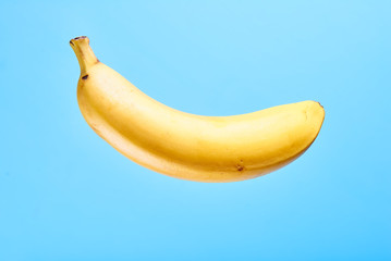 Yellow banana on a blue background
