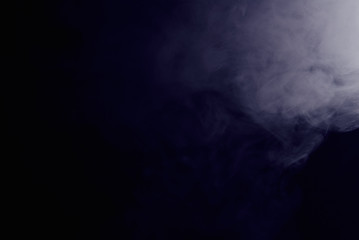 grey smoke on a dark background