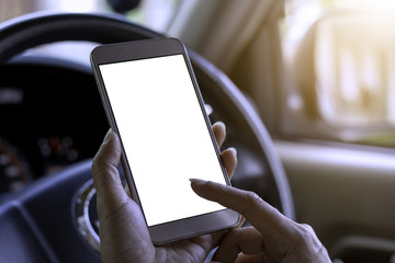 Female hand holding and using modern mobile smartphone with empty white screen for your content, text message and advertising.