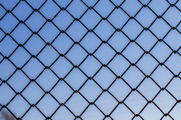 Metal fence from the grid. Protective fence. Texture