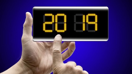 Two hands holding a mobile Smartphone and new year 2019 coutdown - Powered by Adobe