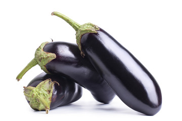 Three ripe eggplants on white background closeup isolated  top view group