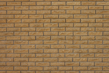 Obraz premium The wall of decorative facing bricks. Close-up 