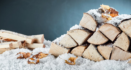 Woodpile with stacked logs and kindling