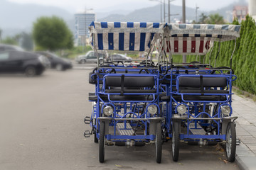 Obraz na płótnie Canvas four-wheeled motorcycle for rent. tourist transport for walking around the area