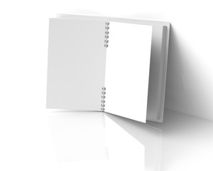 White hard cover book lean on wall