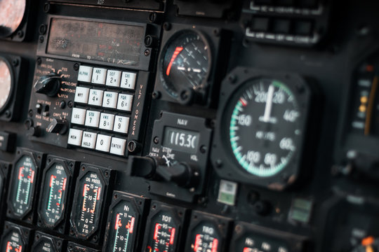 Helicopter cockpit. Details of dashboard, control panel, indicators and fire buttons. War machine, air bomber. 