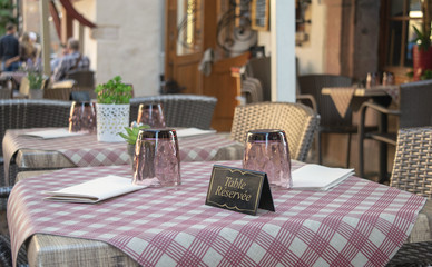 Elegant french Restaurant table with reserved french card Leisure concept Service industry