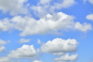 Naklejka premium White clouds in the blue sky