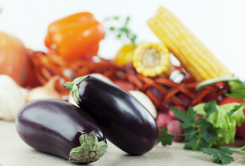 eggplant on a background of fresh vegetables