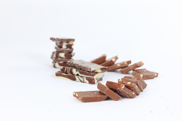 slices of original milk chocolate .isolated on white