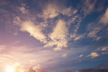 Naklejka na ściany i meble Evening sun with sky with clouds For background.