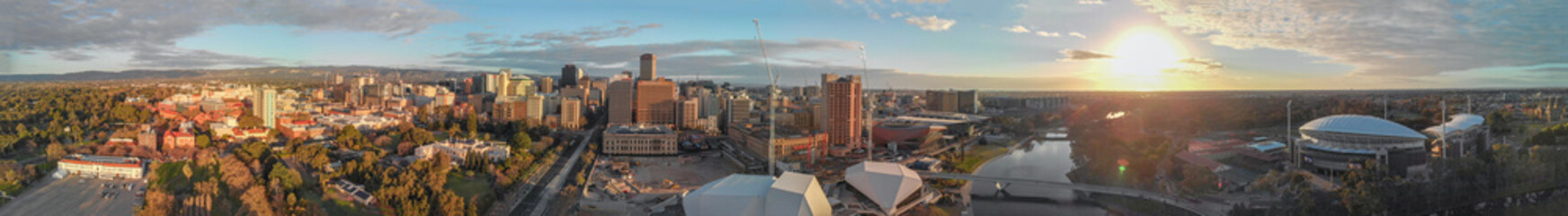 Stunning aerial panoramic view of Adelaide skyline at sunset, South Australia