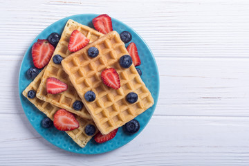 Belgian waffles with strawberry and blueberry