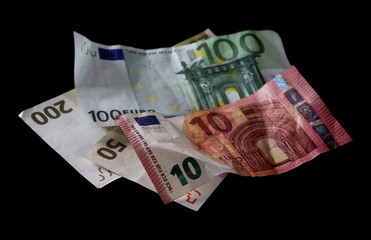 Obraz premium Various euro bills, banknotes isolated on white background