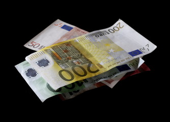 Various euro bills, banknotes isolated on white background