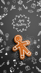 Gingerbread man with chalk doodles on black background