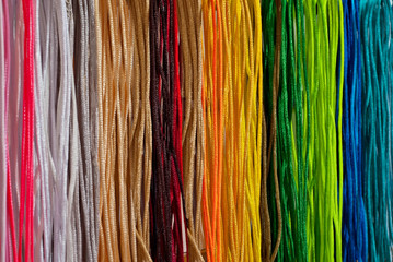 multicolored ropes in the store on the counter