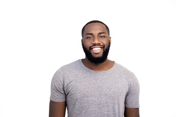 Young handsome black man, smiling face expression, looking in camera, positive mood, happy emotion,...
