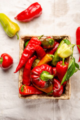 Harvest fresh peppers in crate