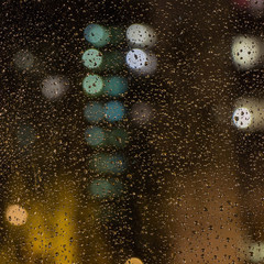 Raindrops on the window glass. The view from the window