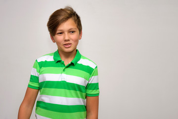 Studio portrait of a teenage boy on a white background with different emotions.