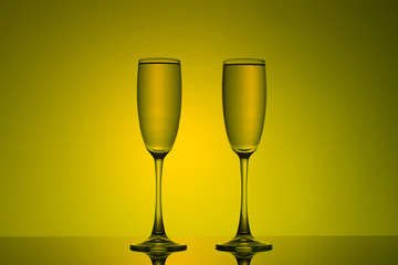 two glasses of golden Shapman 
