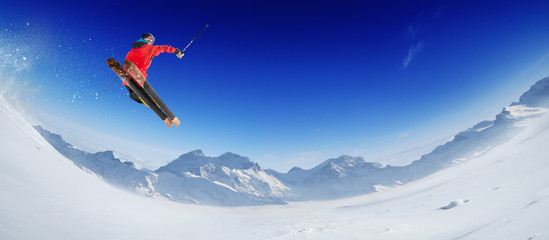 Skiing. Jumping skier. Extreme winter sports.