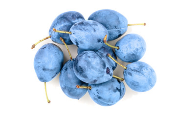 plums isolated on a white background. Top view. Flat lay pattern