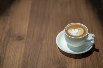 coffee latte art espresso in coffee shop vintage color tone