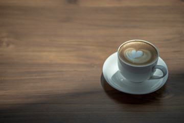 coffee latte art espresso in coffee shop vintage color tone
