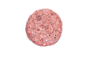 A top view of a raw beef burger isolated on a white background.