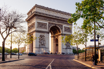 Fototapeta na wymiar Paris Arc de Triomphe (Triumphal Arch) in Chaps Elysees at sunset, Paris, France.