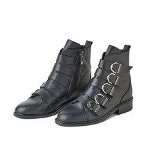 Women black leather boots with belts. Isolated on white background