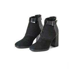 Women black suede and leather boots with block heels. Isolated on white background