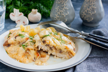 Chicken fillet breast with cheese and mushrooms, selective focus