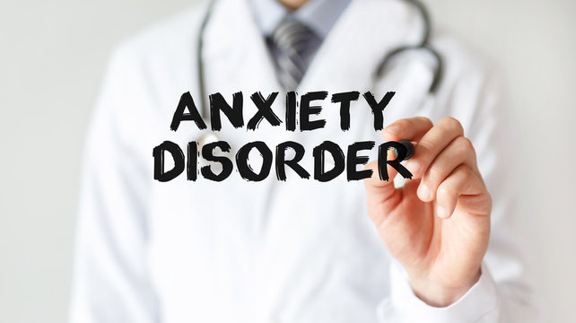 Doctor writing word Anxiety Disorder with marker, Medical concept
