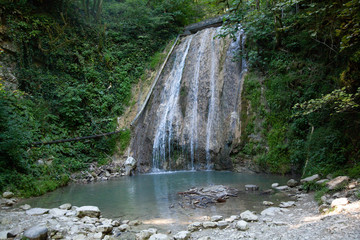 picturesque waterfall in the mountains
