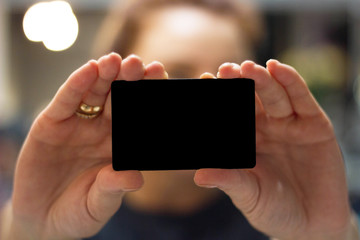 business card in hand