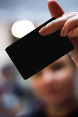 business card in hand